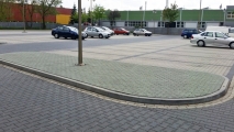 <h5>Roboty drogowe</h5><p>Pas rozdziału, kostka w kolorze zielonym</p>